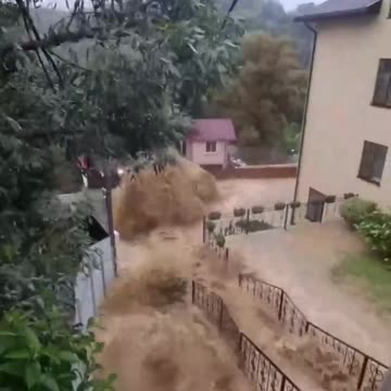 Severe flooding in Sochi as torrential rains turn streets into WATERFALLS