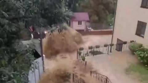 Severe flooding in Sochi as torrential rains turn streets into WATERFALLS