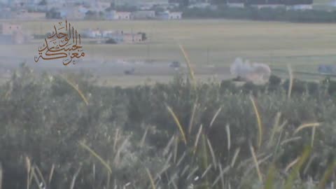 Syria War N. Hama, Rebels shooting RPGs at regimes armored vehicles 2013.05.02