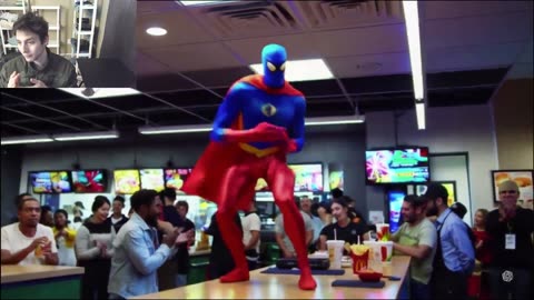 Man In A Fictitious Superhero-Inspired Costume Dancing At McDonald's Fake Funny Parody Video