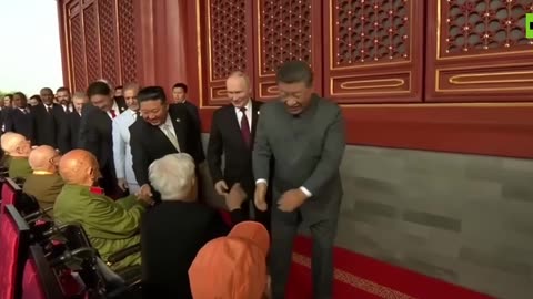 CLOSE-UP: Putin, Xi, and Kim walking SIDE-BY-SIDE