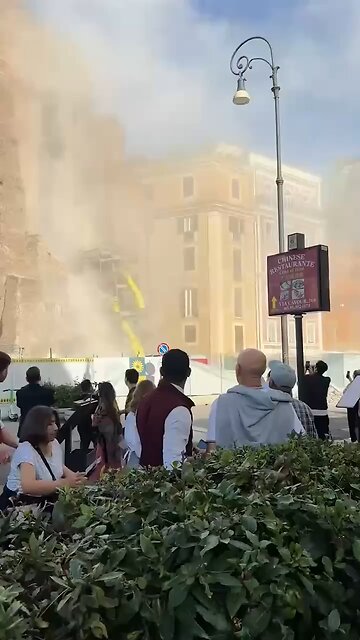 A medieval tower partially collapsed in central Rome
