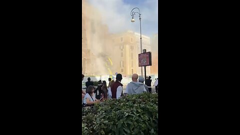 A medieval tower partially collapsed in central Rome