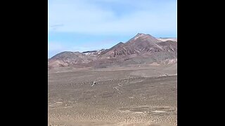 F-18 Superhornet buzzing the dessert mountains