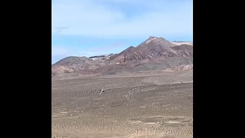 F-18 Superhornet buzzing the dessert mountains