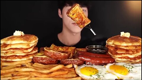 French toast, sausage, fried eggs