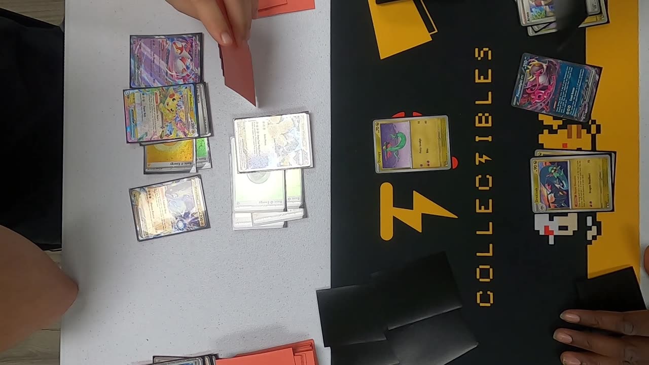Dragapult ex/Dusknoir vs Iron Hands ex/Miraidon ex at TP Collectibles | Pokemon TCG
