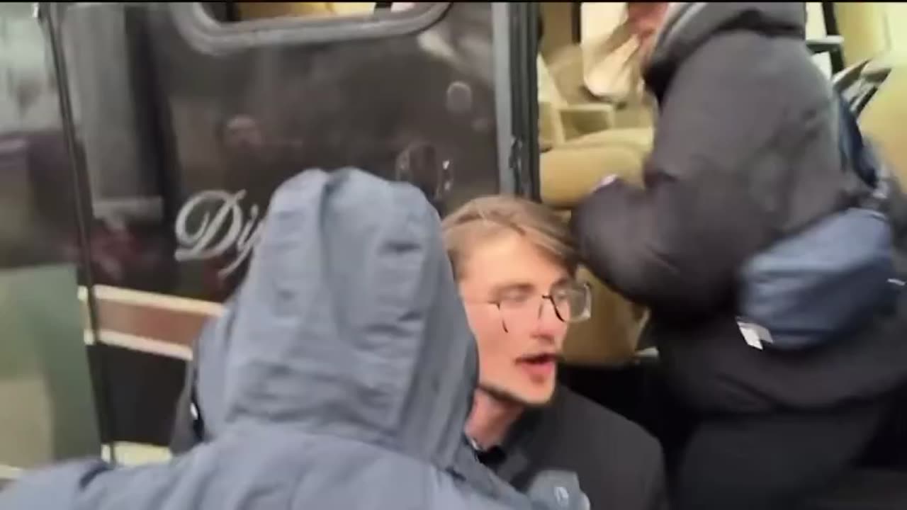 Muslims/ Antifa attack reporter