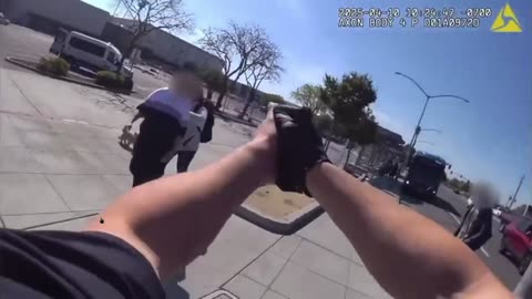 Nice Damn Shot: Cop takes out woman holding a knife to someone. BAM
