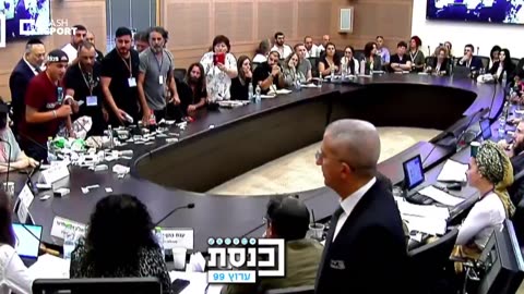 Israeli occupation soldiers throw piles of psychiatric medication onto a table during a parliamentary session to discuss the increasing phenomenon of suicide among the army.