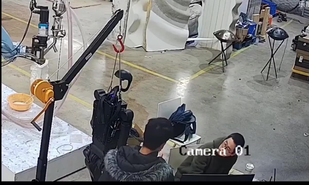 Watch the chilling moment humanoid robot wakes up and starts attacking its handlers in China