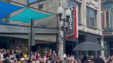JB Pritzker spotted trotting through an LGBTQ pride parade with children present