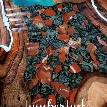 AMAZING TABLE - River table with colored rocks in distressed wood.