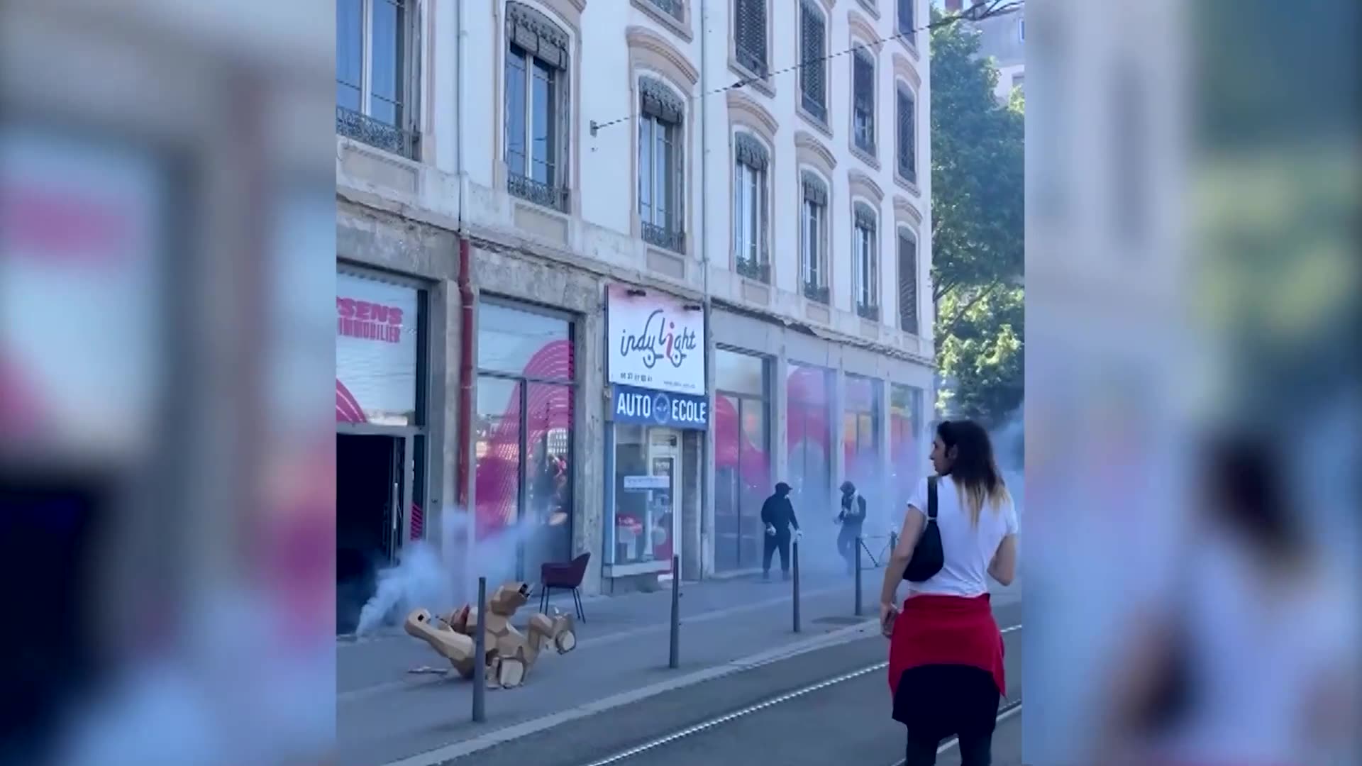 Police use tear gas during May Day protest in Lyon
