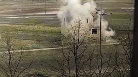 Soldiers of the 70th Infantry Division shoot rifle grenades at a German Position