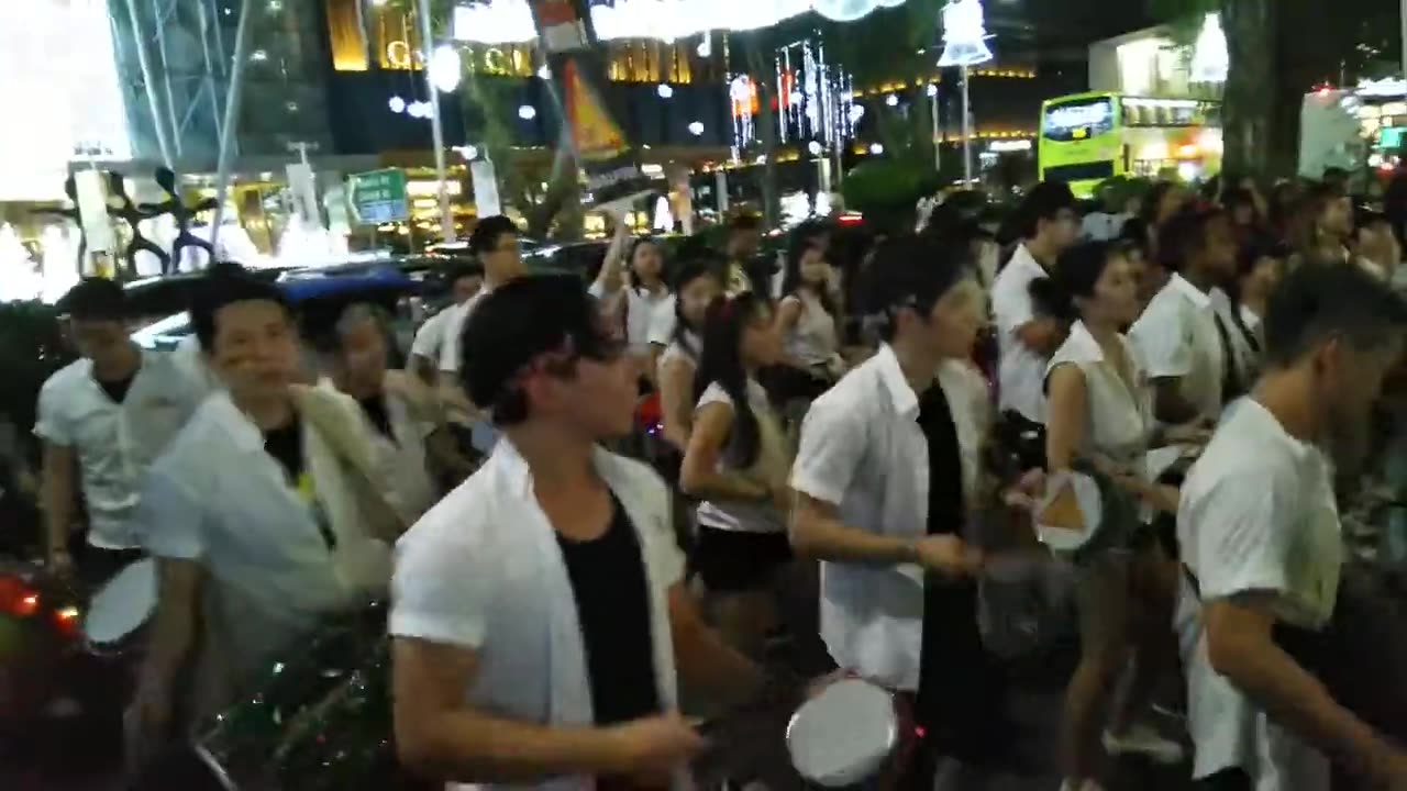 Students from SMU Samba Masala perform and dance in Orchard Road, Singapore