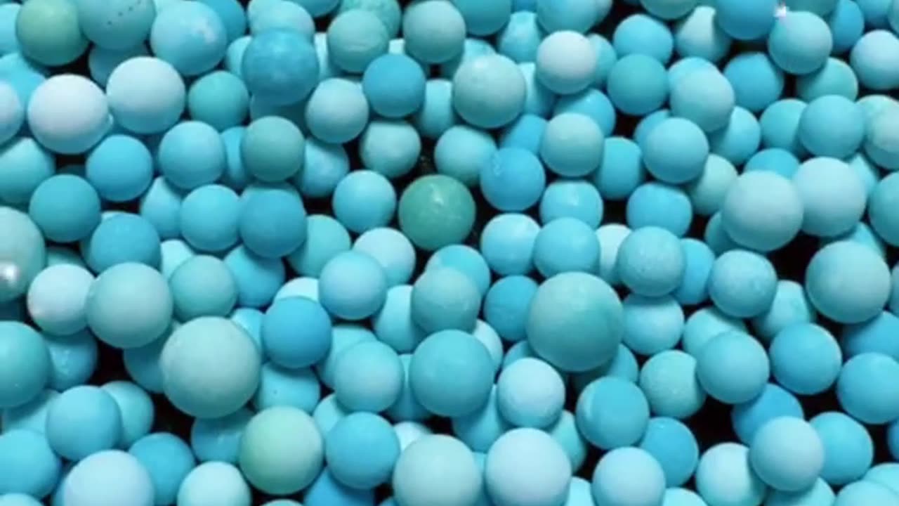 250430-6 Selected natural raw turquoise to create plump round beads.