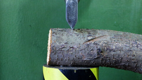 Hydraulic Press Cutting Wood