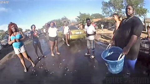 Female Cop Gets Sprayed by People With Water Guns#4990