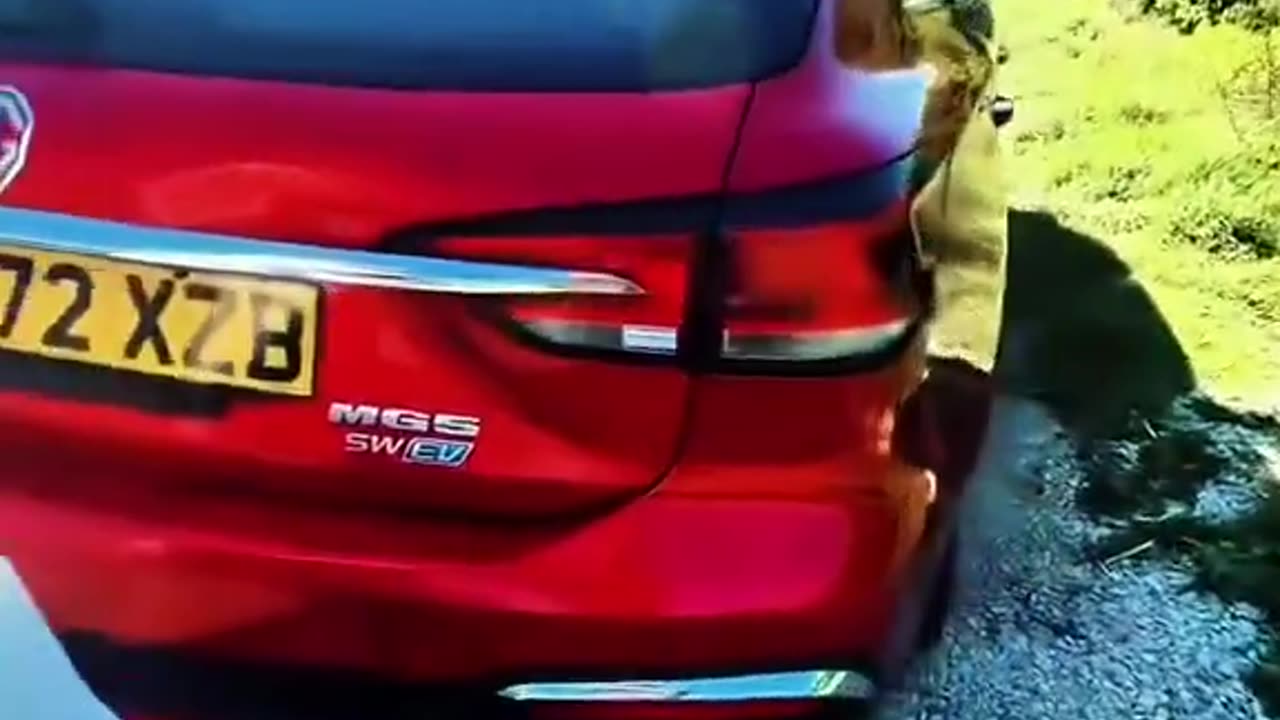 FilthyIndian dumps trash in field.