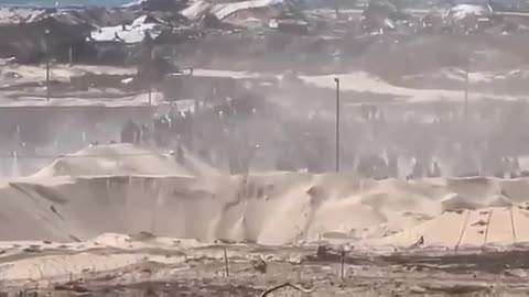 Footage purportedly shows thousands of Palestinians overrunning one of the