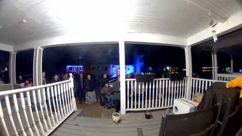 Cat Escapes When Opening the Door to Christmas Carolers