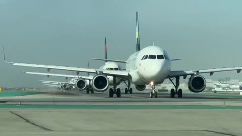 Queue for departure at Los Angeles airport, USA, during rush hour