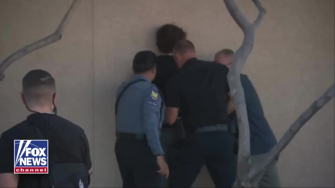 Man Wearing Identical Shirt To Suspected Assassin Desecrates Charlie Kirk Memorial In Phoenix