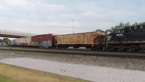 Norfolk Southern train with two John Deer Tractors going through Alliance, Ohio