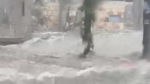 raging river as severe thunderstorms in Austin as the city was battered by golf ball-sized hail.