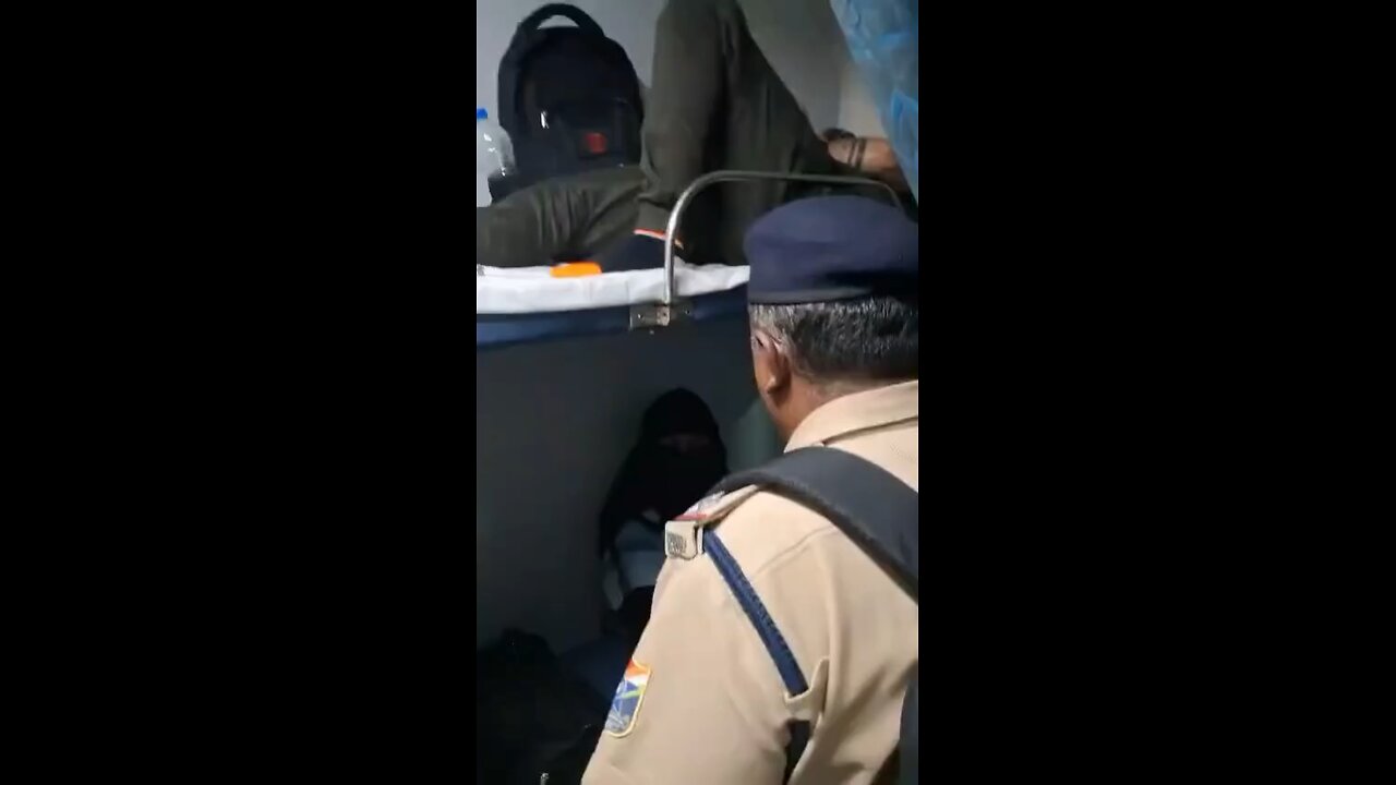 Muslin woman abusing ticket checker