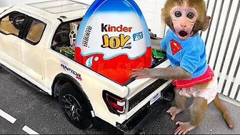 Monkey Baby Bon Bon eats Kinder Joy surprise eggs and plays with puppy in the swimming pool