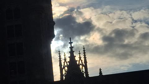 The white sun(blue hue) and yellow sun behind the "clouds"