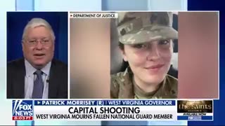 Standing ovation at WVU game for two slain National Guard soldiers