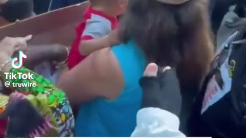 Liberals surround a mom with her baby to block her from attending a Christian rally in Seattle