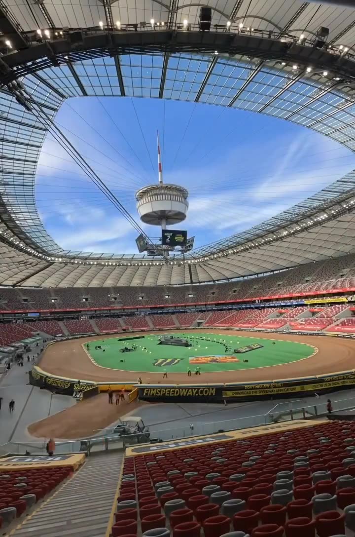 Warsaw National Stadiums retractable roof structure is 240 × 270 m and the central spire stands at 100 meters above the pitch