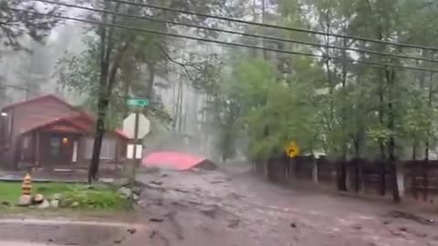 Residents watch their homes and belongings FLOATING away in New Mexico