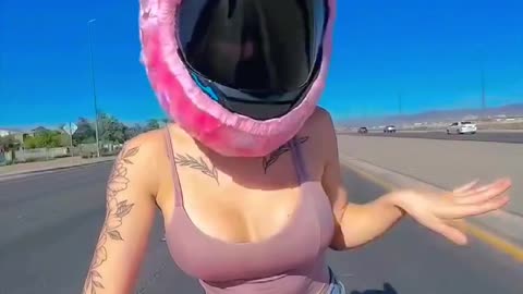Cute girl riding bike with lovely pose