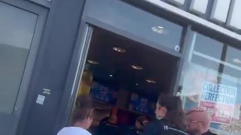 Domino's in Wimbledon being raided by Home Office Immigration today.
