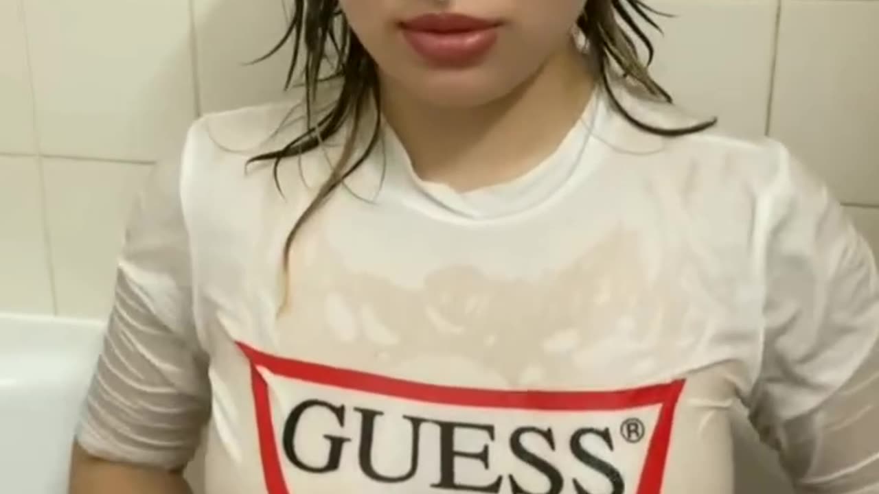Why is she making her T-shirt soaking wet