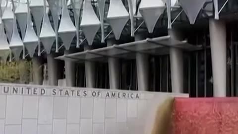 Activists turn US embassy blood red in London