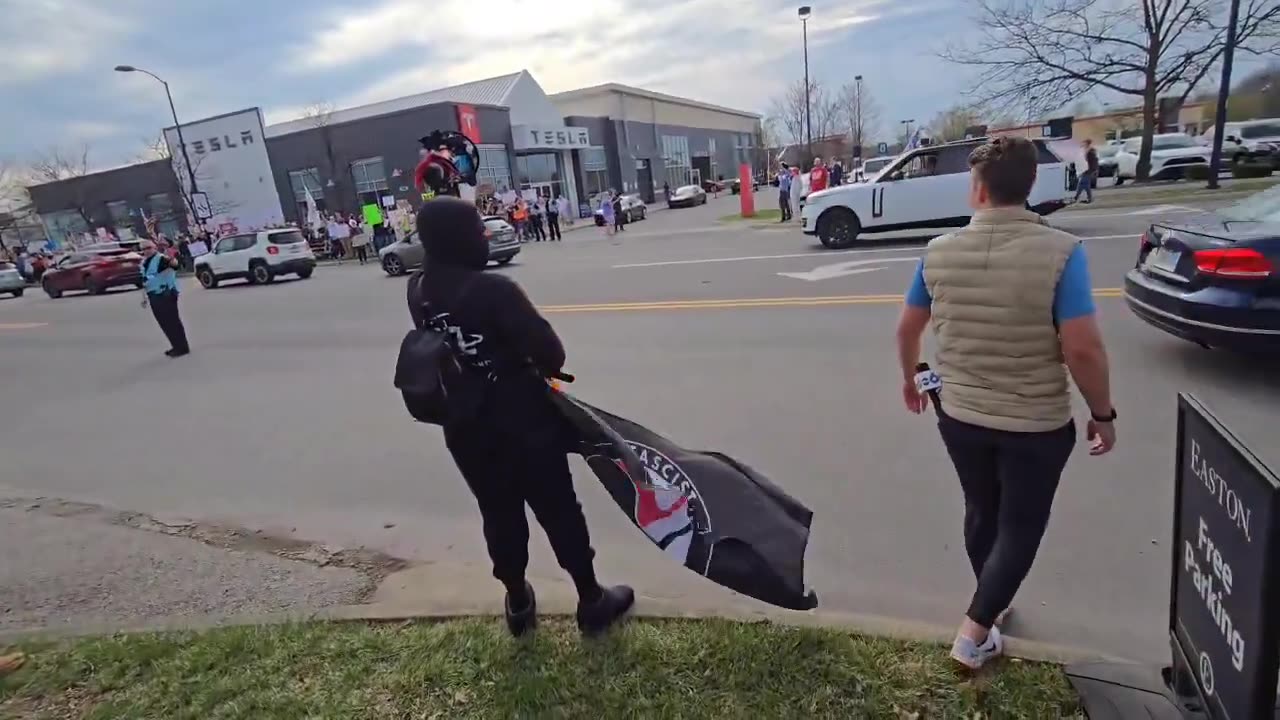 ANITIFA is proudly waving their flag here at the "Tesla Takedown" event in Columbus, Ohio.