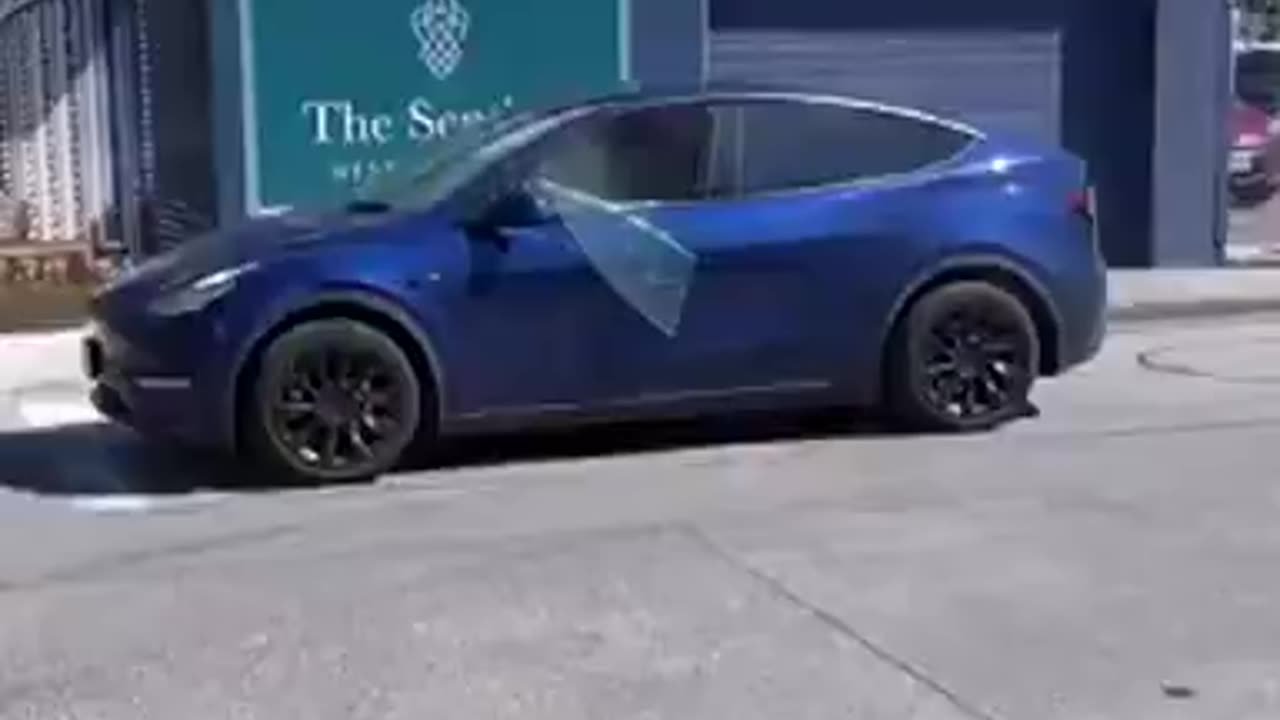 Tesla Driver Says He Had To Kick The Windows Out Of His Car To Escape After It Caught Fire