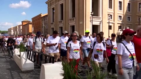 LGBTQ+ pilgrims pass through Holy Door of St. Peter's Basilica