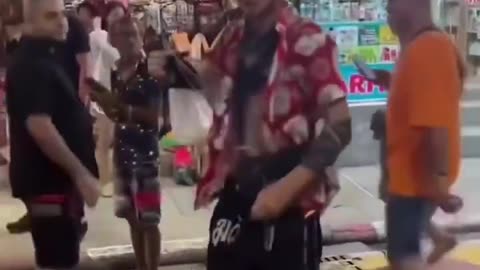 Woman Flicks Cockroach Off Tourist, Learns It’s His Pet as It Crawls Back to Him..