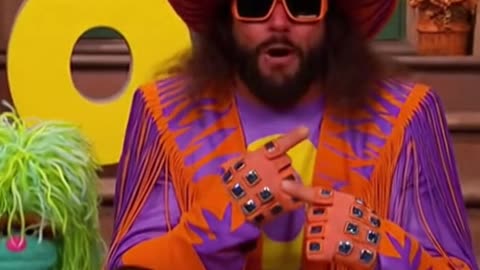 Today's guest on Sesame Street is Macho Man and he's excited, today's letter is O, YEAH!