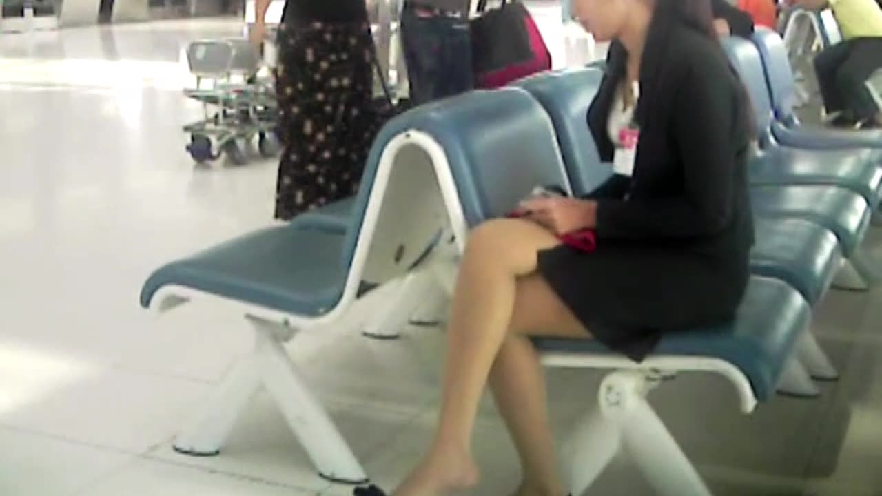 Nylon dangling...lady in biz suit!