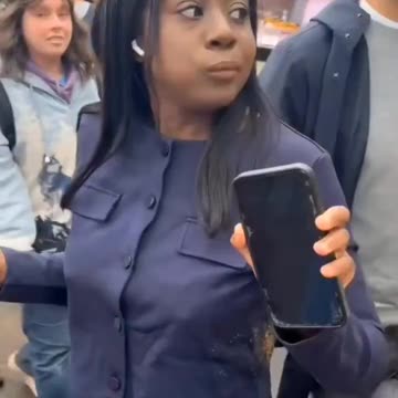 African woman who attacked Britons in Camden has been arrested for racist and religious attacks.