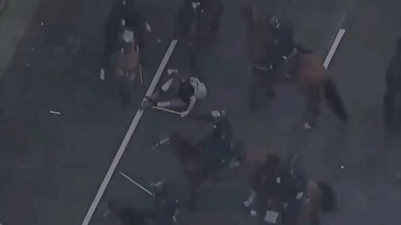 LAPD Horse Police Unit Attacks Protestor On The Floor