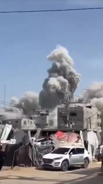 Shocking scenes unfold as a powerful israeli missile strike demolishes a residential housing complex